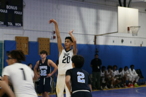 Jared Vargas shooting a free throw during their scrimmage against Eleanor Roosevelt High School.