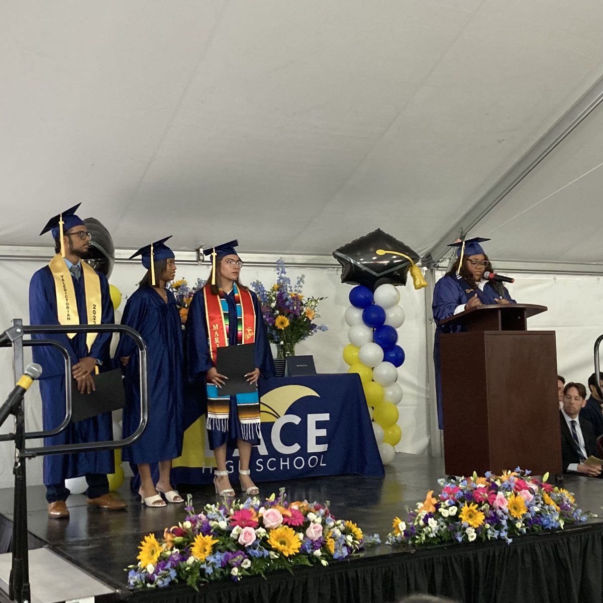 The 2023 graduation ceremony was held in two shifts in a tent set up in the yard next to the school building.