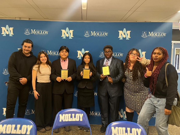 Debate Team Tournament Success (Mr. Doliber, Kata Borg, Omar Saquisili, David Fasasi, Arami Zaracho and Ndey Newlands.