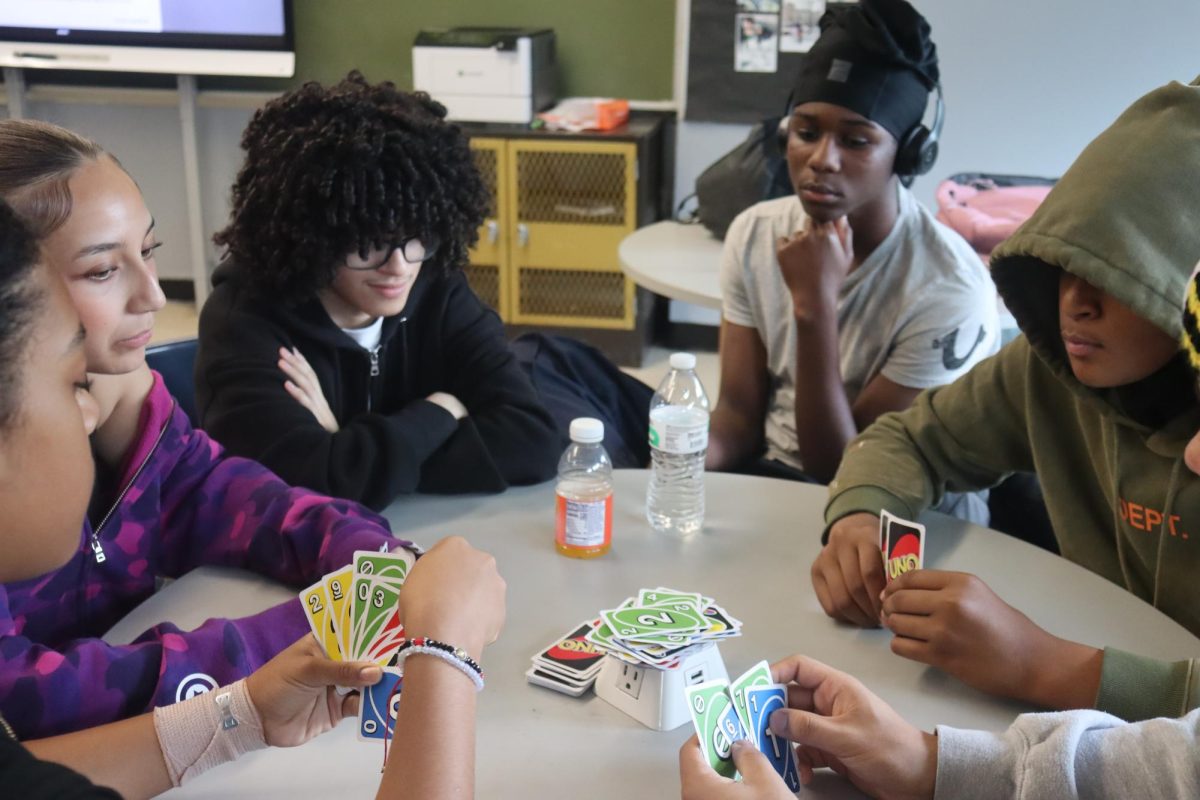 Mr. Wooh's freshman advisory class playing Uno.