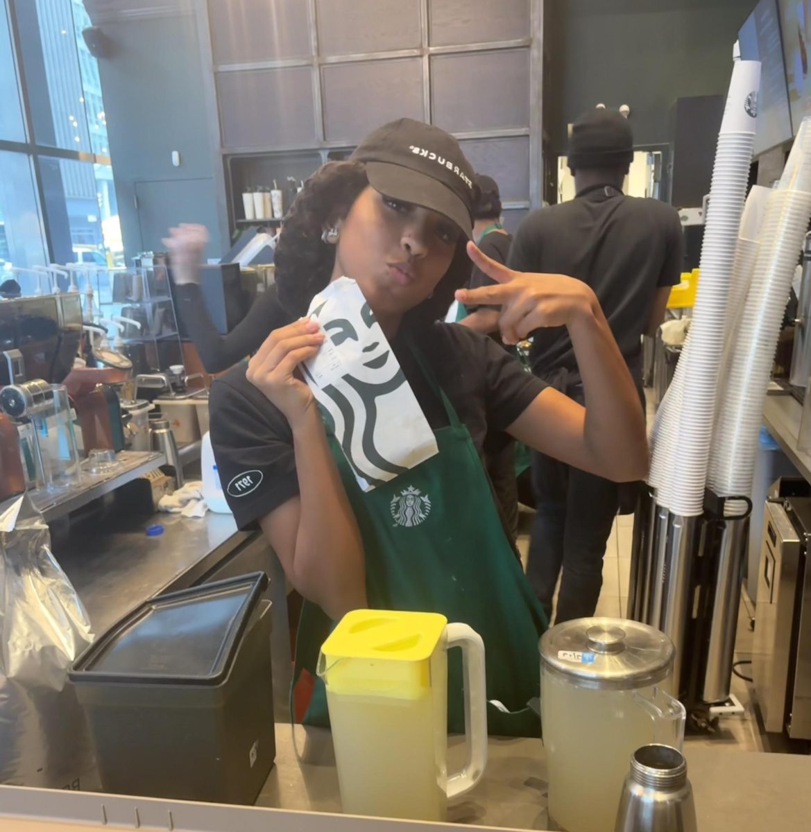 Vivienne Levy working the register at Starbucks.