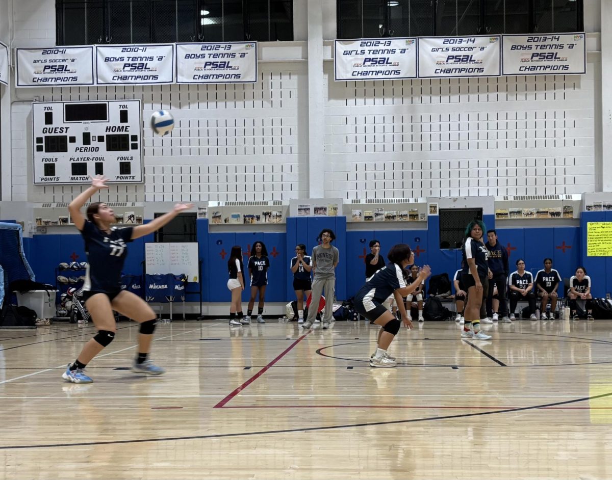 Berg delivers powerful serves to the opposing team.
