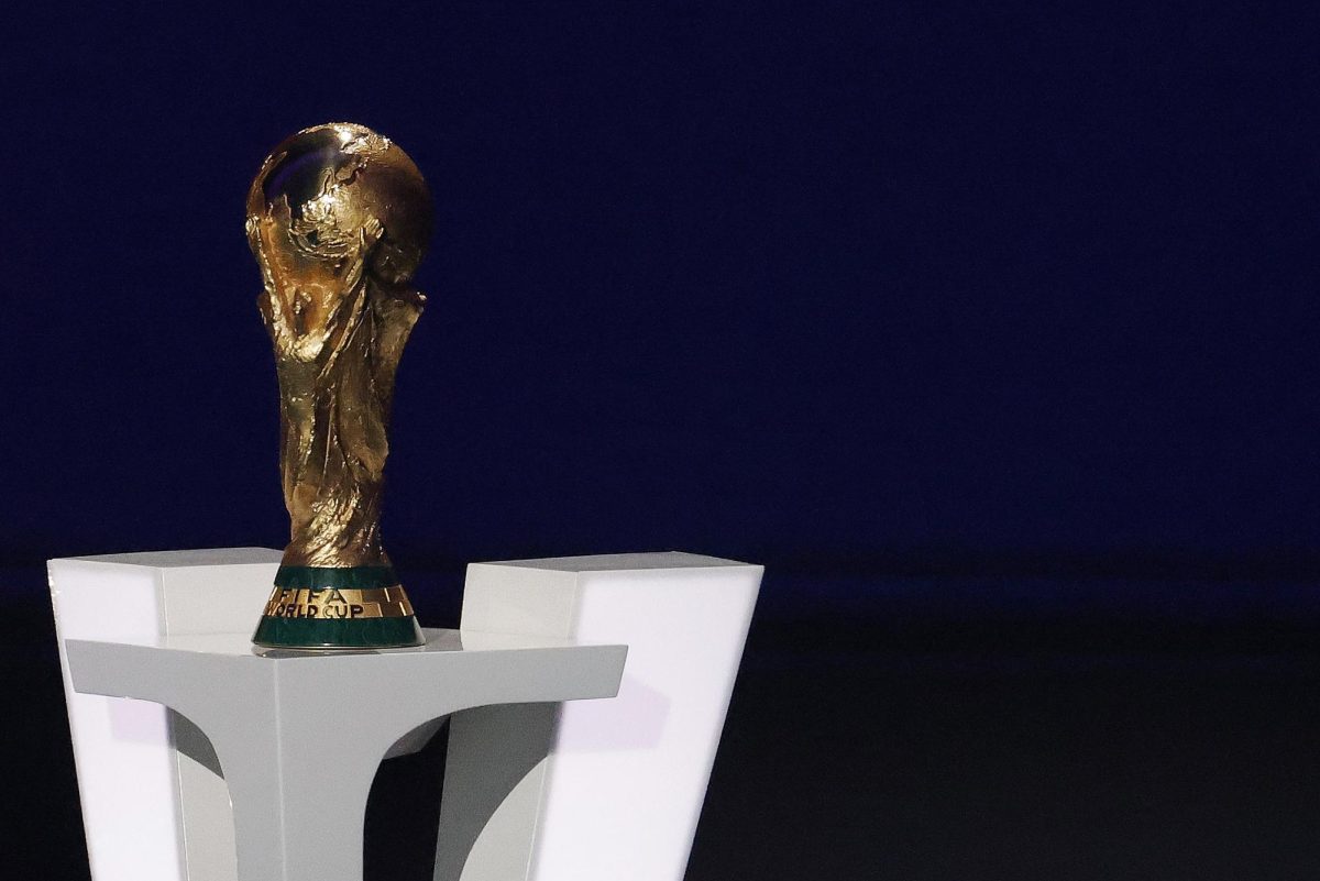 Dec 5, 2025; Washington, District of Columbia, USA; The World Cup trophy sits on a podium during the FIFA World Cup 2026 Final Draw at John F. Kennedy Center for the Performing Arts. Mandatory Credit: Amber Searls-Imagn Images